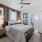 Bedroom with natural lighting and high ceilings