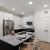 Well-lit kitchen with ample counter space