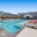 Resort-style swimming pool with lounge seating
