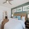 Bedroom with natural lighting and high ceilings