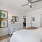 Bedroom with natural lighting and high ceilings